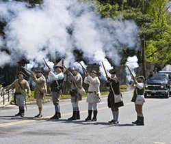 Sudbury Companies of Militia and Minute firing musket salute during Stow Springfest