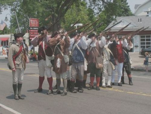 Sudbury Companies of Militia and Minute at the ready during 2010 Brookline Flag Day parade